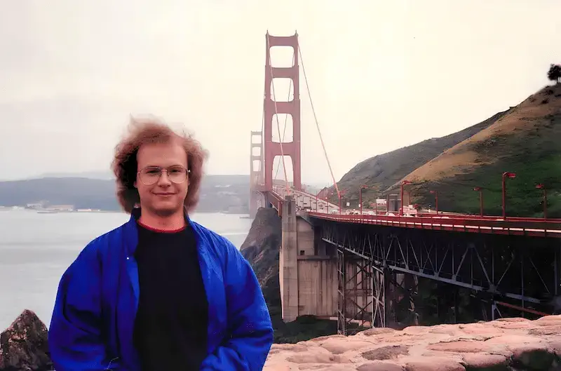 Younger Matt standing with the Golden Gate Bridge in the background.