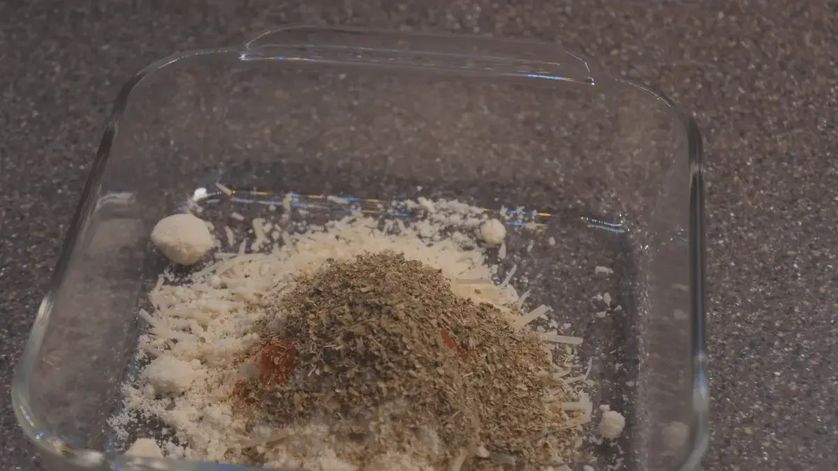 Glass container with mixed spices and flour